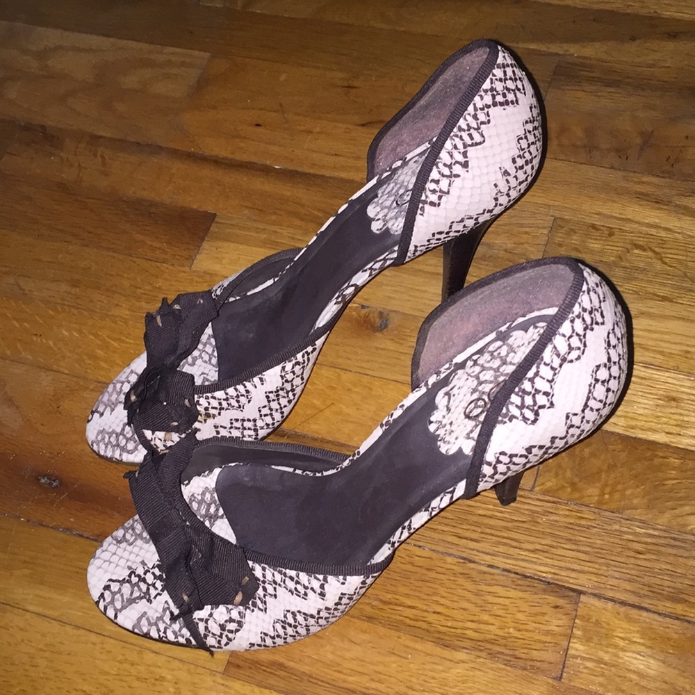 Brown and white heels